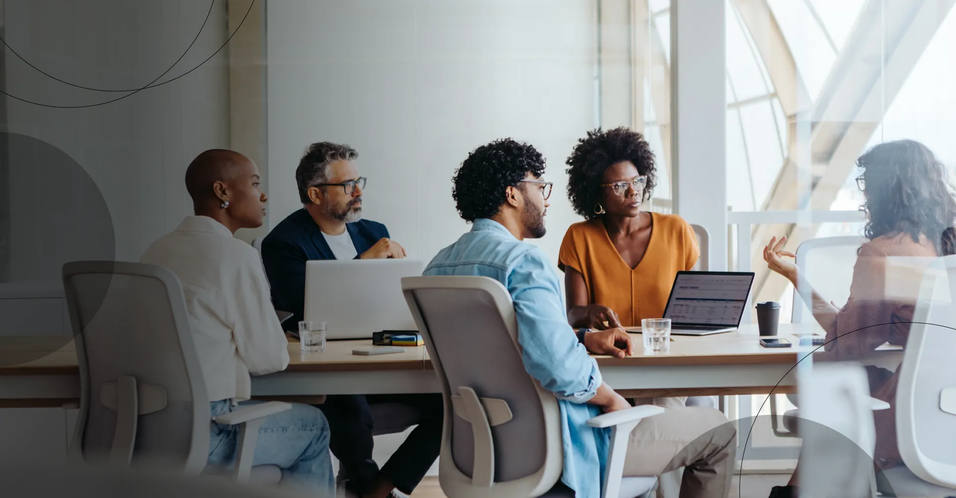 photo of a meeting room with a multidisciplinary team