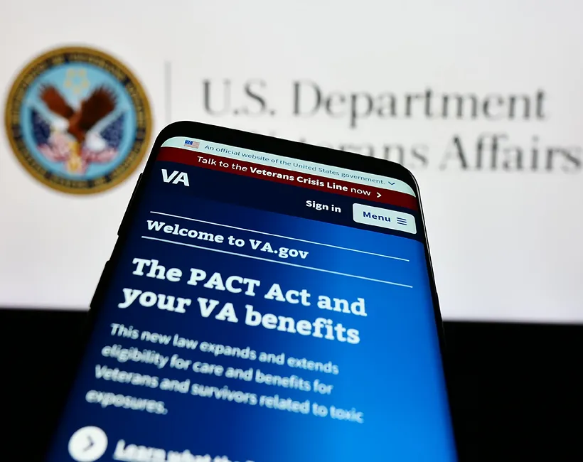 close up of a smartphone browsing the government benefits website for veterans