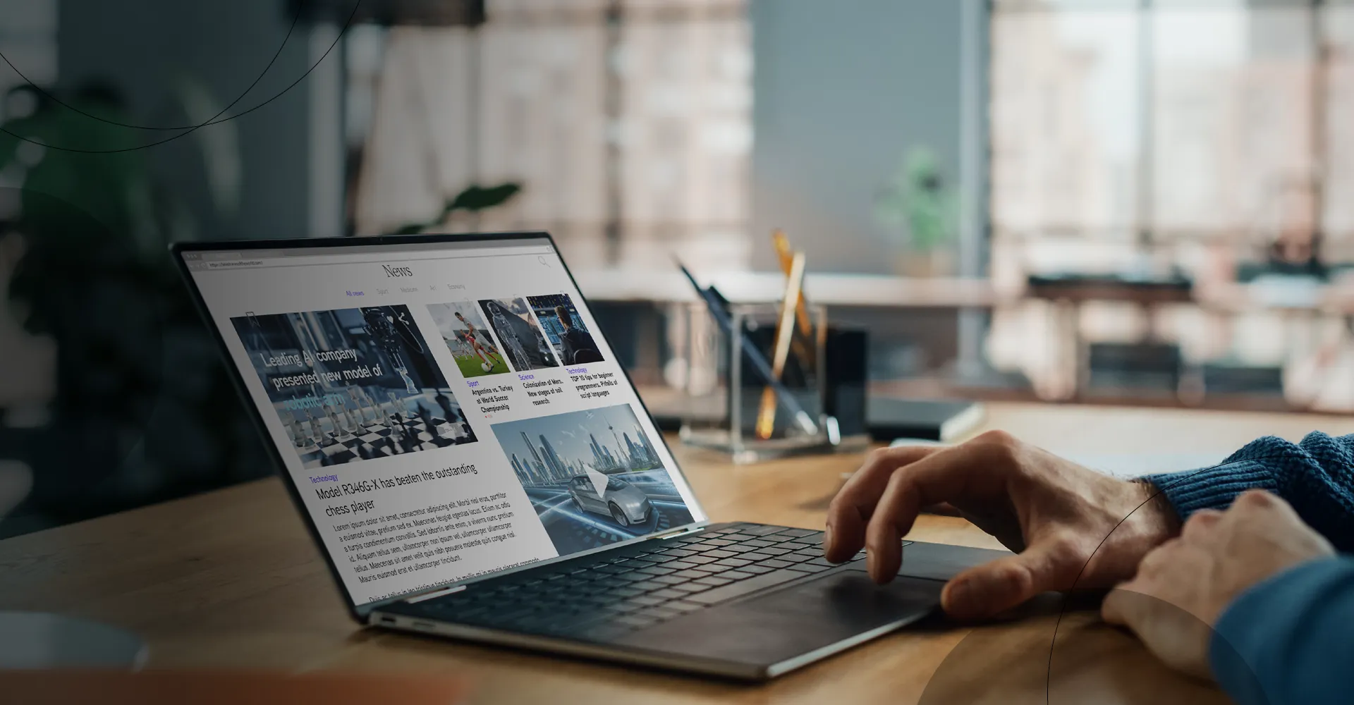 A photo of a laptop with a man browsing a news website